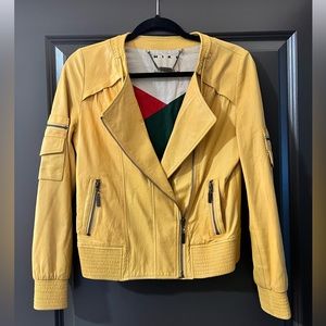 Mike Gonzalez yellow soft leather jacket.